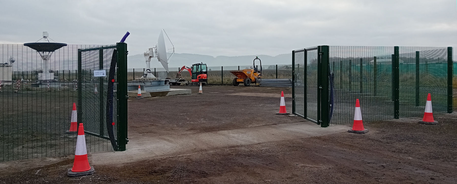 Photo of our entrance gate showing the fence